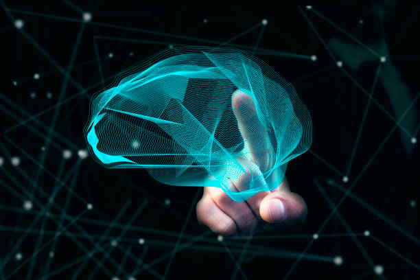 istock Businessman holding digital human brain with cells 915435458