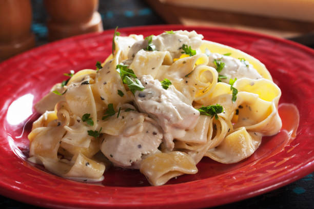istock Italian fettuccine alfredo pasta 915436228