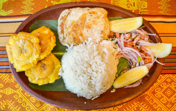 istock Llapingachos are fried potato cakes that originated in Ecuador. They are usually served with a peanut sauc 915436300