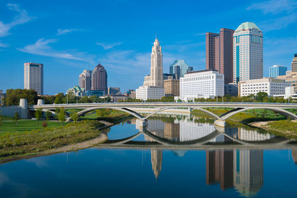 istock Columbus downtown skyline with bridge and water reflections 915444652