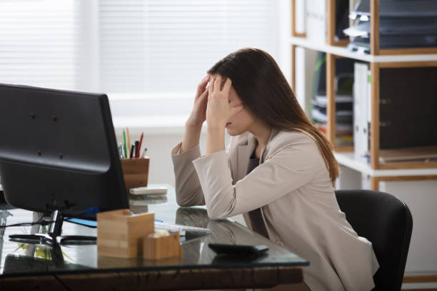 istock Businesswoman Having Headache 915448346