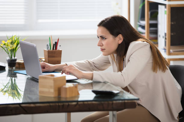 istock Businesswoman Using Laptop 915448356