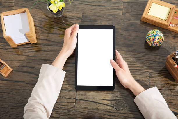 istock Businessperson Holding Blank Digital Tablet 915448414