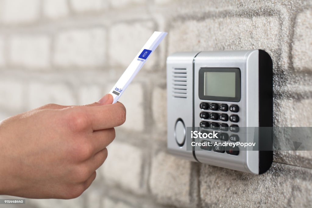 Electronic Key System To Lock And Unlock Door A Person's Hand Holding Access Card To Lock And Unlock Door Accessibility Stock Photo