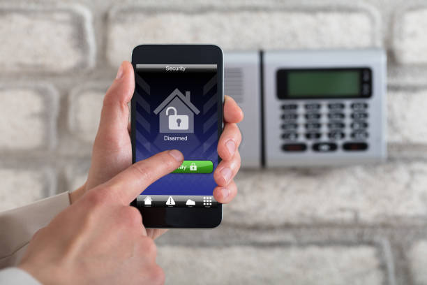 istock Hand Disarming Security System Of Door 915448452