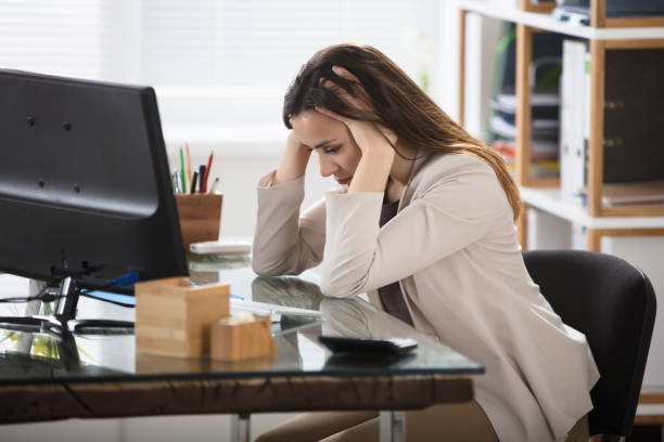istock Businesswoman Having Headache 915448478