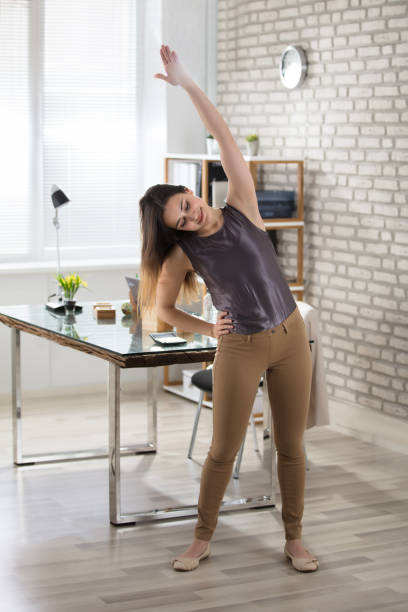 istock Businesswoman Stretching 915448508