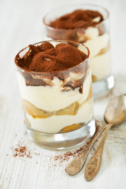istock tiramisu in glass on wooden surface 915448744