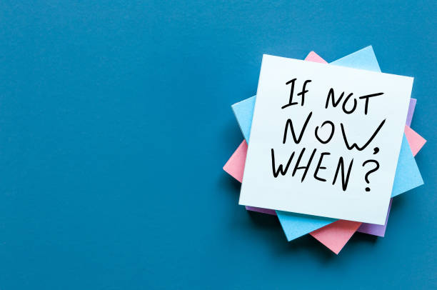 If Not Now When, text on a stack of note paper. Motivating and inspiring question, mockup and template with empty space for text