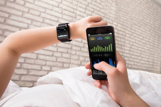istock Hands With Smart Phone And Watch 915454440
