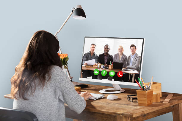 istock Woman Video Conferencing With Colleagues On Computer 915454562