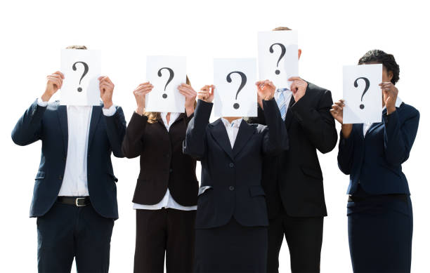 istock Businesspeople Hiding Face Behind Question Mark Sign 915454714