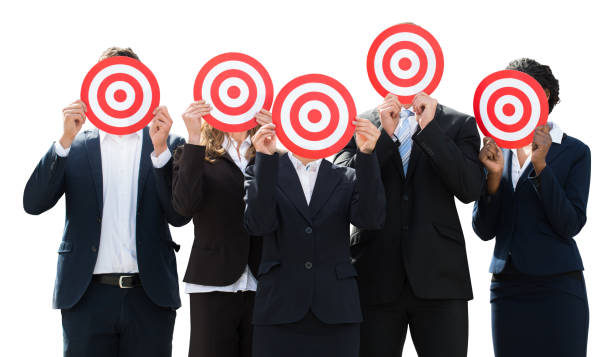 istock Businesspeople Hiding Face With Dartboard 915454716