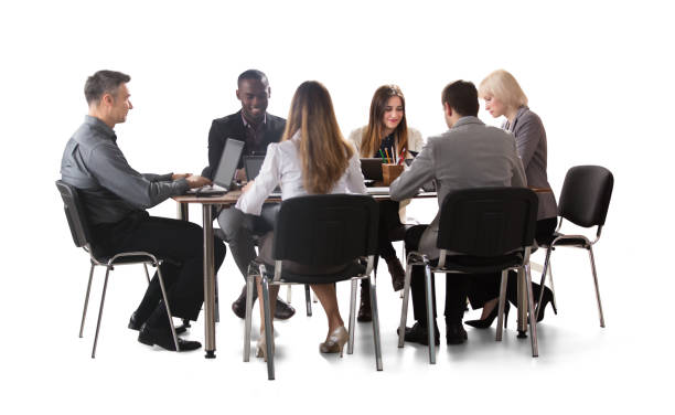 istock Diverse Group Of Businesspeople Working On Laptop 915454726