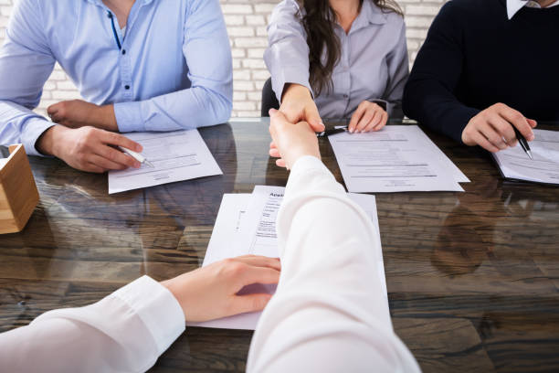 istock Shaking Hand With Corporate Recruitment Officers 915458028