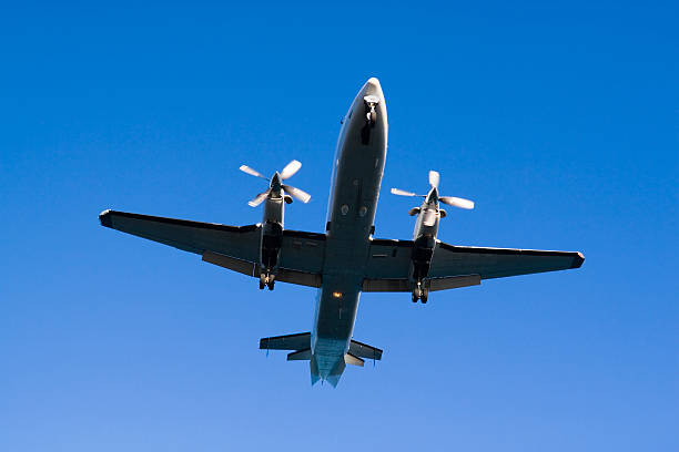 istock Four-bladed propeller plane during takeoff/landing 91545846