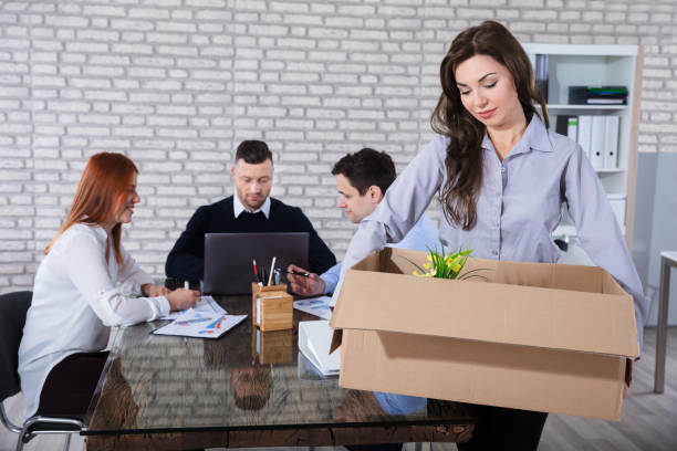 istock Fired Employee With Belongings 915458608