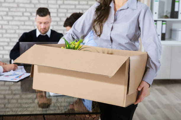 istock Unemployed Woman With Box 915458610