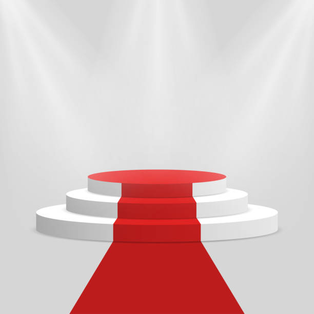 istock Red carpet and podium. White round pedestal with stairs isolated on background. Stage for winners and award ceremony 915461264