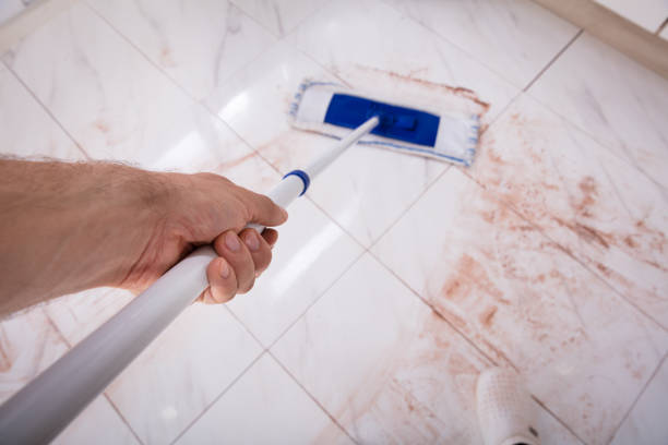 istock Person Holding Mop And Mopping Dirty Kitchen Floor 915461862