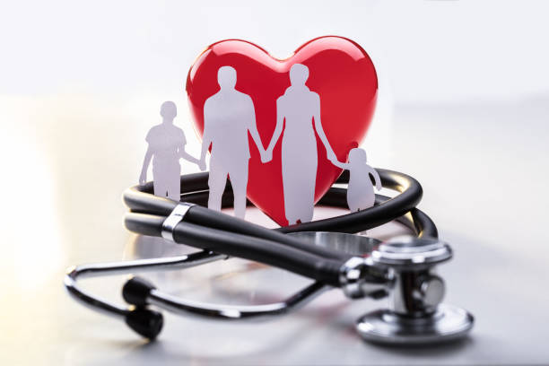 istock Family Cut-out And Stethoscope 915463410