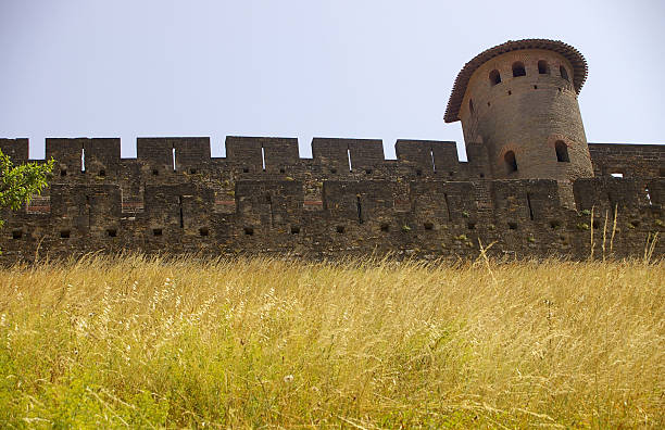 Double city walls with dry grass slope stock photo
