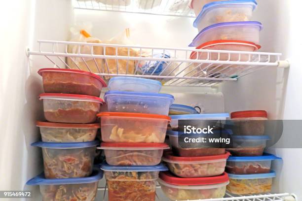 Food Packaged And Frozen Inside A Home Freezer Stock Photo - Download Image Now - Leftovers, Freezer, Frozen