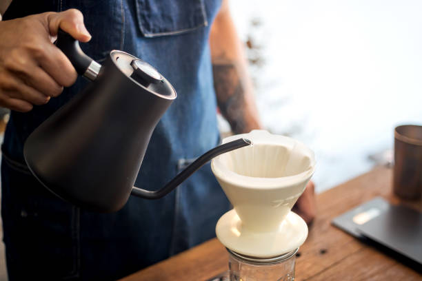 istock Barista hands to make art coffee 915480660