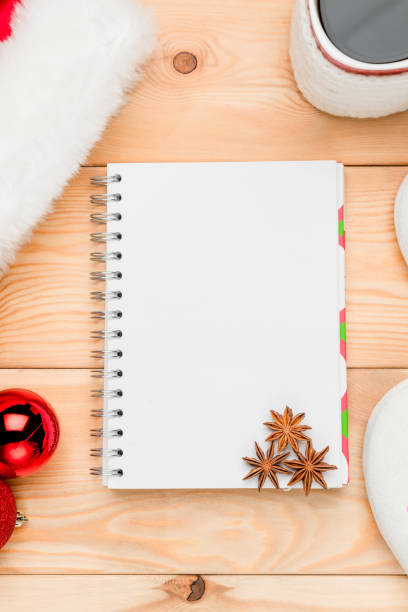istock anise on white sheet of notepad in the bottom corner, christmas card 915483000
