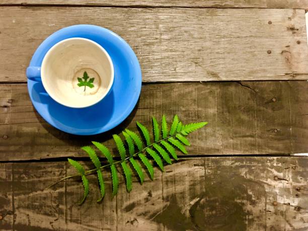 istock High Angle View Of Empty Coffee Cup On Wooden Table 915500378