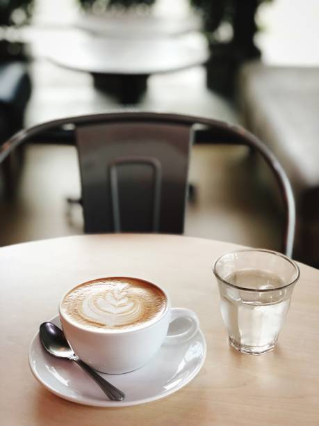 istock Close-Up Of Coffee Cup On Table At Cafe 915510750