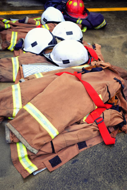 istock High Angle View Of Firefighter Uniforms On Floor 915511292