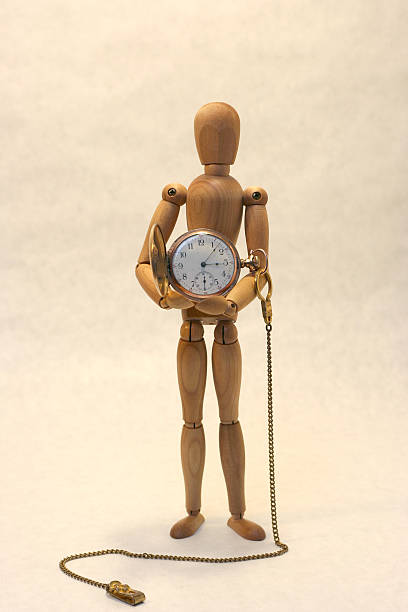 istock Manikin Holding a Pocket Watch 91552372