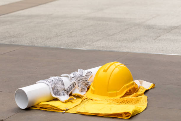 istock Yellow hard safety helmet hat for safety project, Architectural project of workman as engineer or worker 915524250