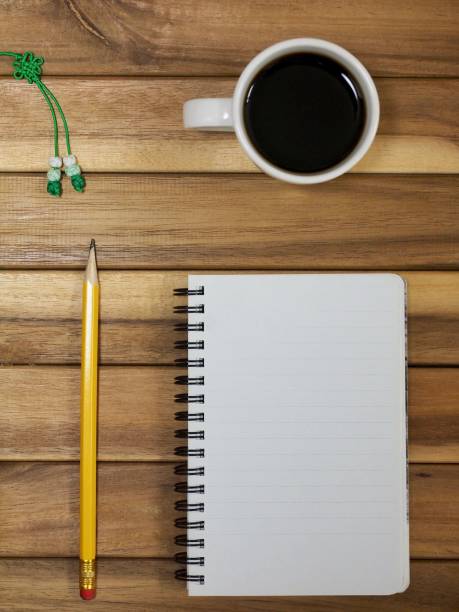 istock Sketchbook and pencil, coffee, fan, notepad 915528288