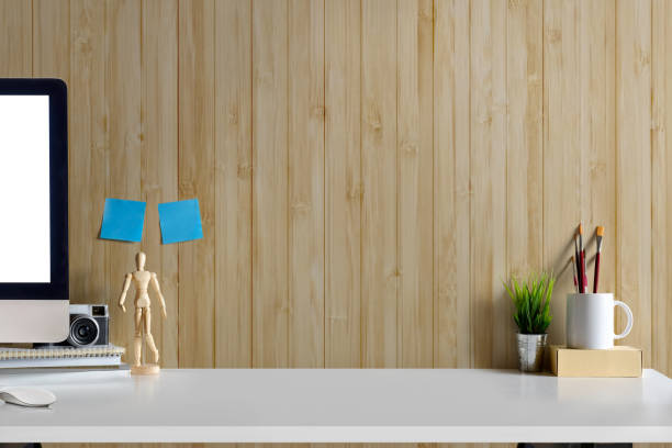istock Mockup modern home decor Desktop computer with dummy, houseplant. Artist workspace with copy space for products display montage. 915531766