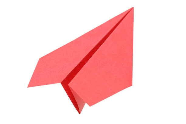 istock Paper airplane flying on white background 915544516