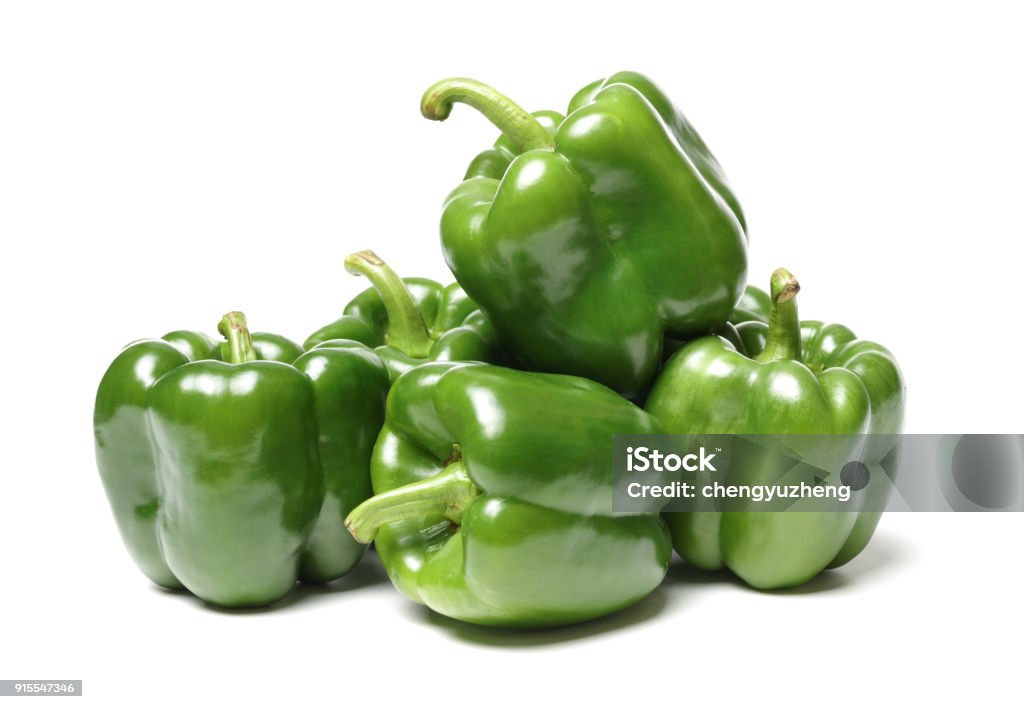 Isolated green capsicum couple on white background Green Bell Pepper Stock Photo