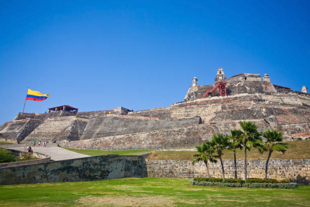 View from city wall with bastion and cannons and the skyline of modern Cartagena in background, Colombia, Unesco World Heritage