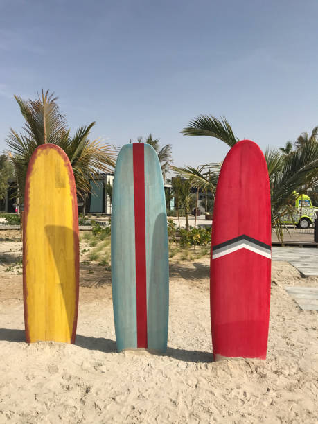 istock Colorful surfboards stand on the beach. 915556644