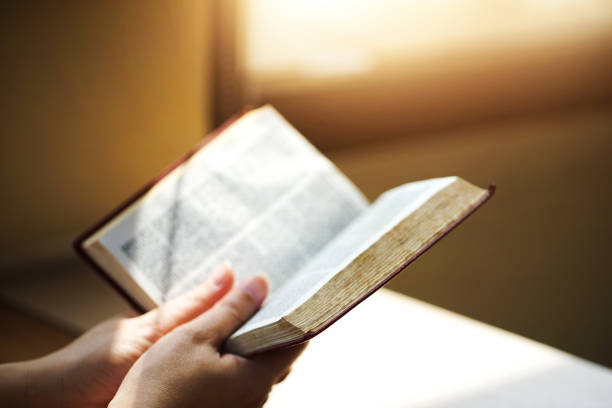 istock Women reading the Holy Bible. 915560230