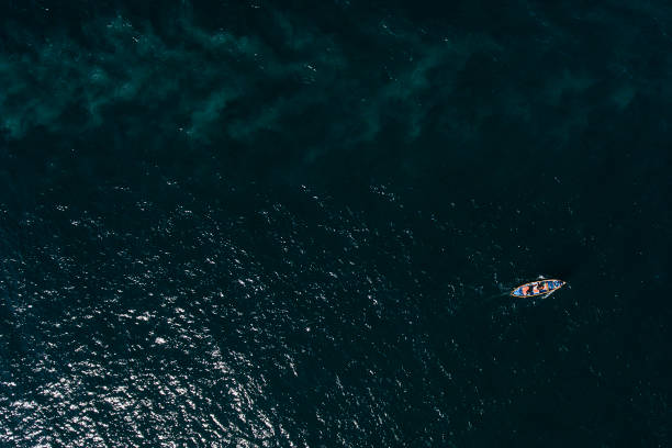 istock Istanbul Bosporus boat overview  image with Drone 915560460