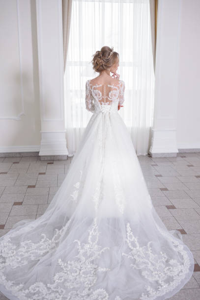 istock A beautiful bride in wedding dress interior 915563292