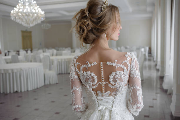 istock A beautiful bride in wedding dress interior 915563660