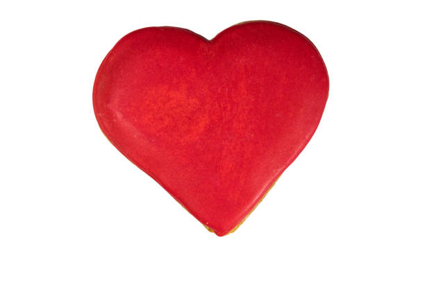 istock Heart shaped gingerbread cookie isolated on white background 915566900