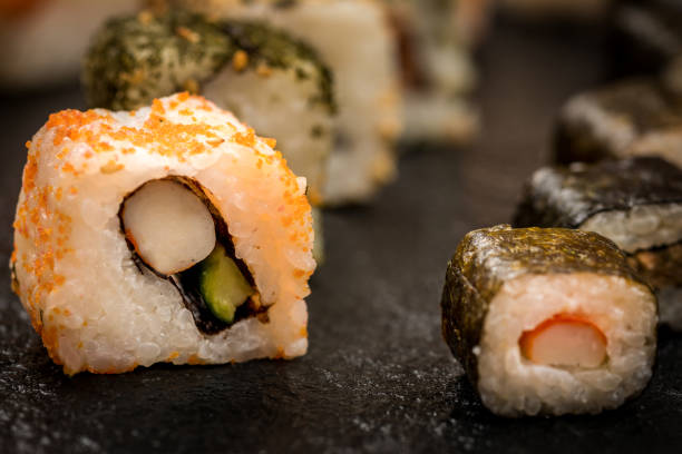 istock Sushi rolls hosomaki and uramaki 915567124