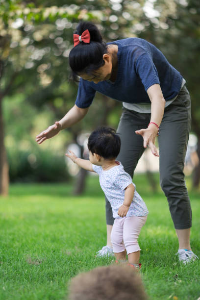 istock Baby and mother playing game 915567742