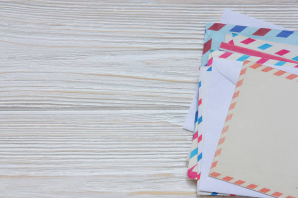 istock envelopes and cards on wooden back 915571256