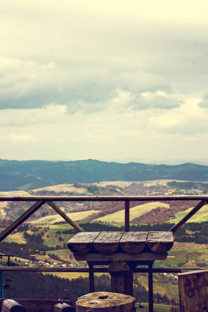 istock Outdoor bench in a nice mountain area 915575052