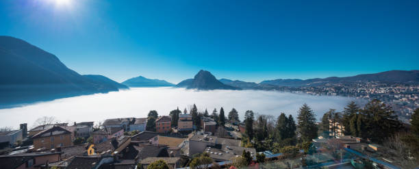 istock Lugano landscape with atmospheric phenomenon 915576392